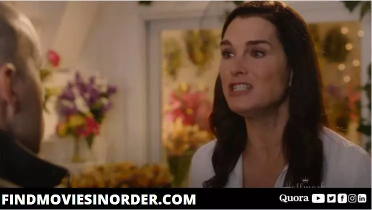 A still from Flower Shop Mystery: Snipped in the Bud (2016). it is the second movie on the list of all Flower Shop Mystery movies in order of release